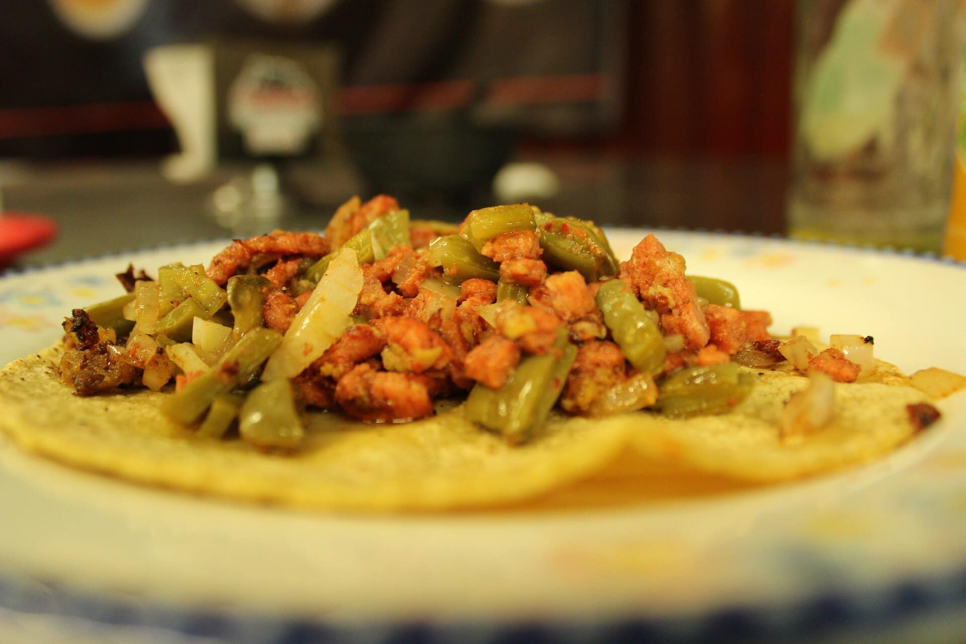 A freshly made Mexican taco served on a plate