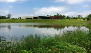 The Trinity River Audubon Center building set among wetland and forest in south Dallas