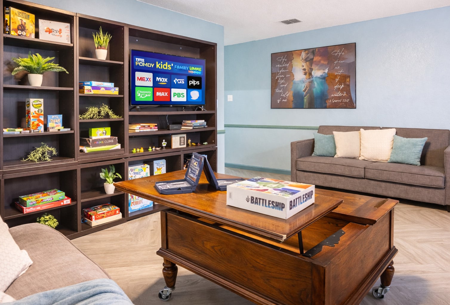 Games, TV and seating for family downtime at Game Room Oasis