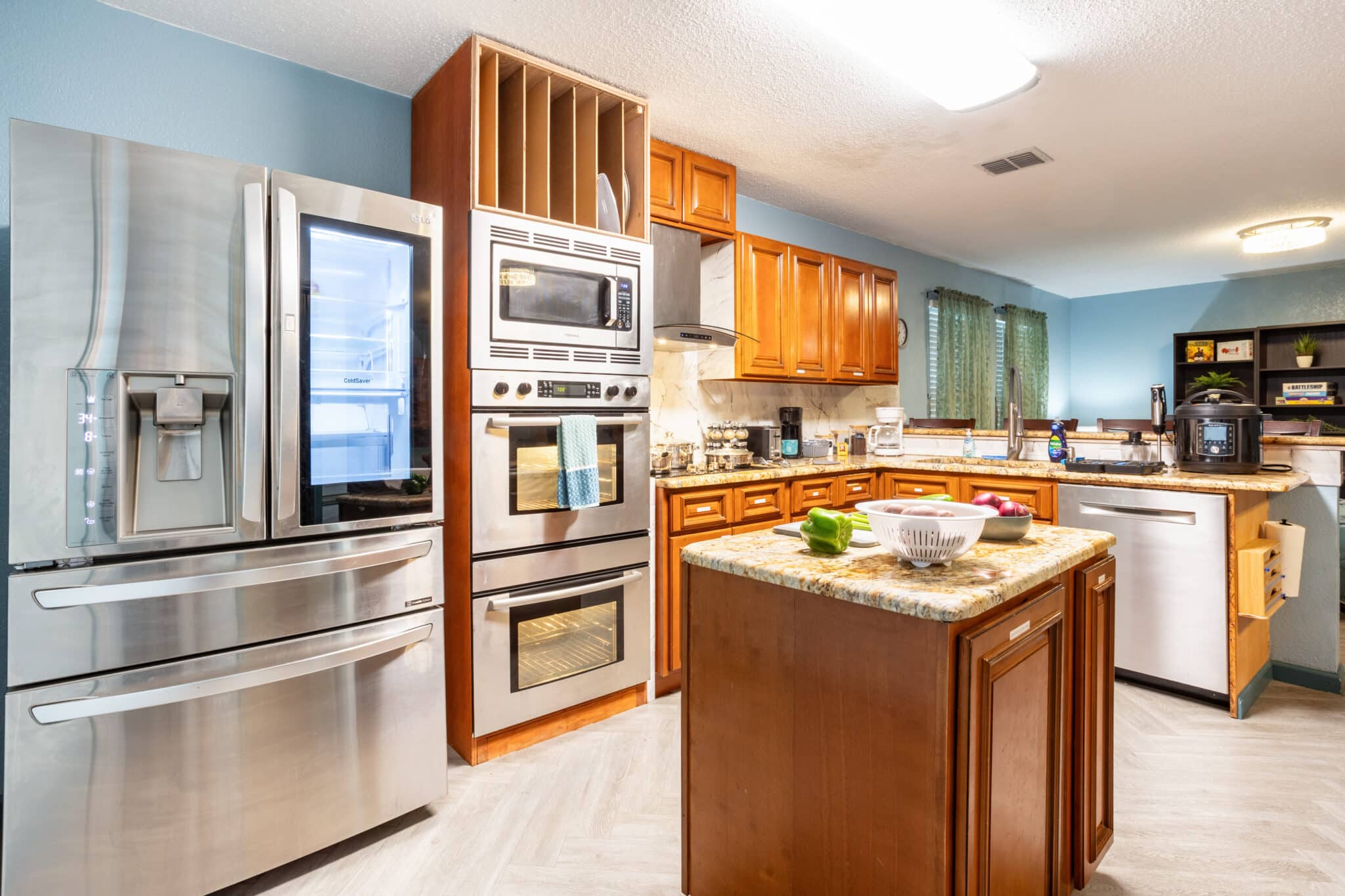 Full kitchen for families and groups staying at Game Room Oasis